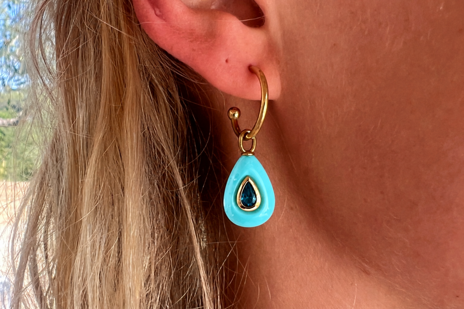 Hana Turquoise Gold Hoop Earrings worn with turquoise-coloured gemstone drops and waterproof 14k gold PVD hoops for effortless holiday styling.