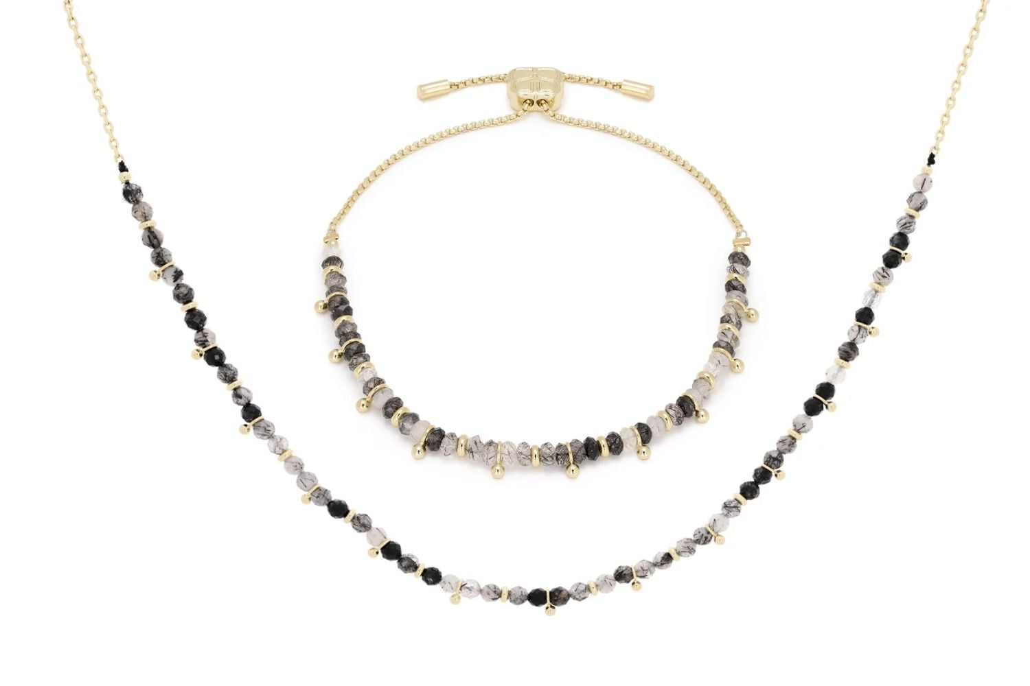 Harmony Black Rutilated Quartz Necklace and Bracelet Set featuring black rutilated quartz beads with delicate inclusions and 12K gold-plated accents for an elegant, bold look.