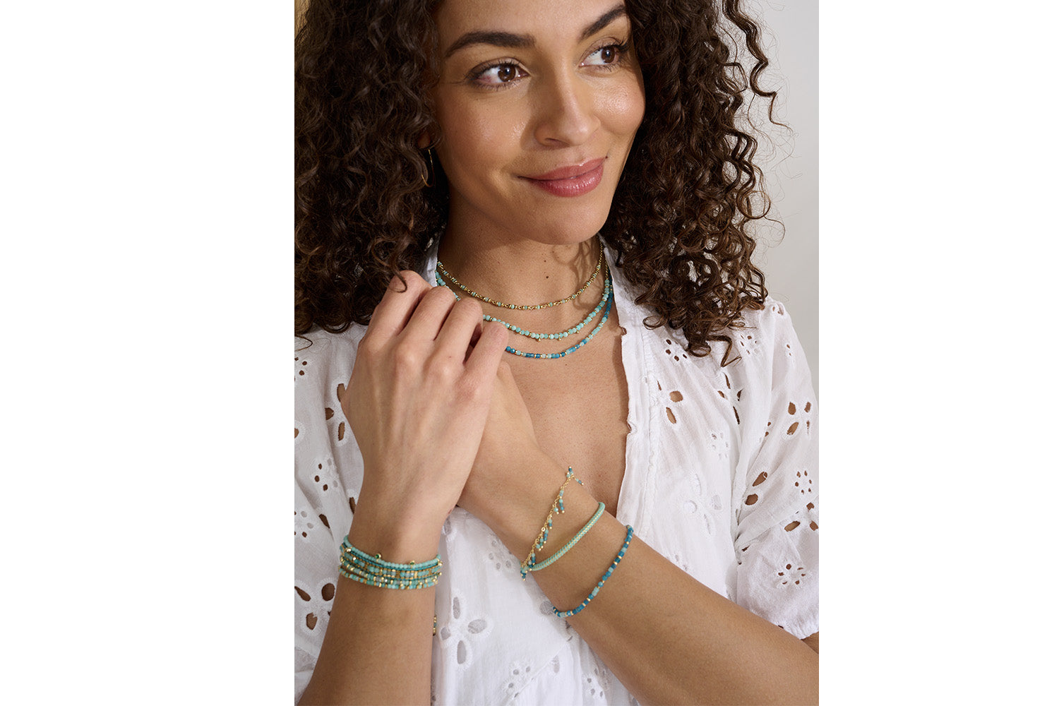 Heather Amazonite and Apatite Gold Beaded Charm Bracelet styled for boho summer vibes, featuring vibrant gemstones and a gold-plated adjustable slider clasp—perfect for layering or standalone wear.