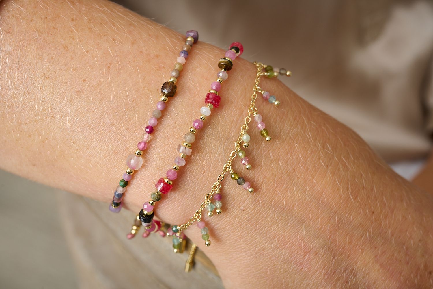 Heather gold tourmaline chain bracelet featured on wrist with Boho Betty stacking bracelets