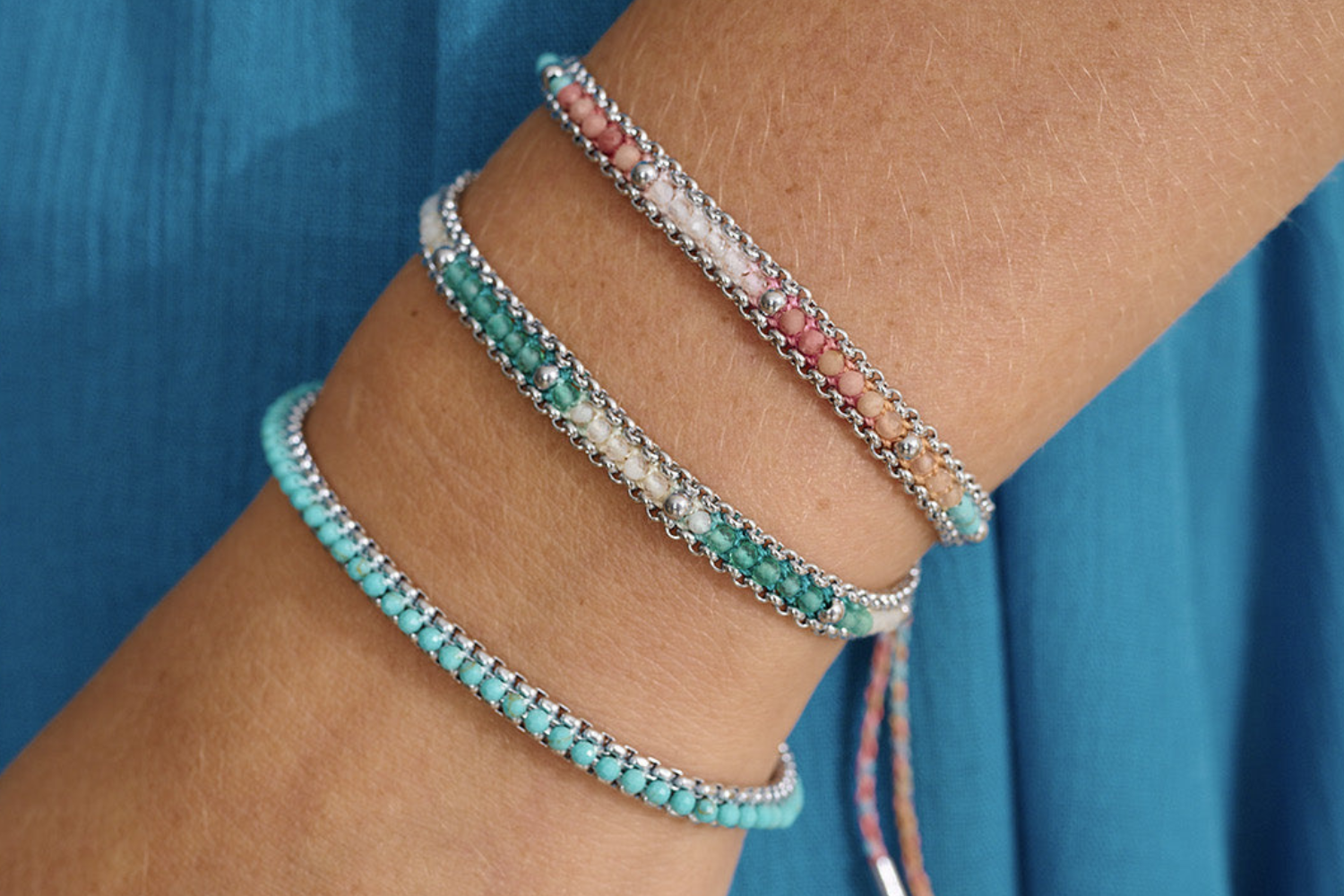 Helaine Candy Silver Bracelet styled with layered silver and colourful gemstone jewellery for a bright, playful boho look.