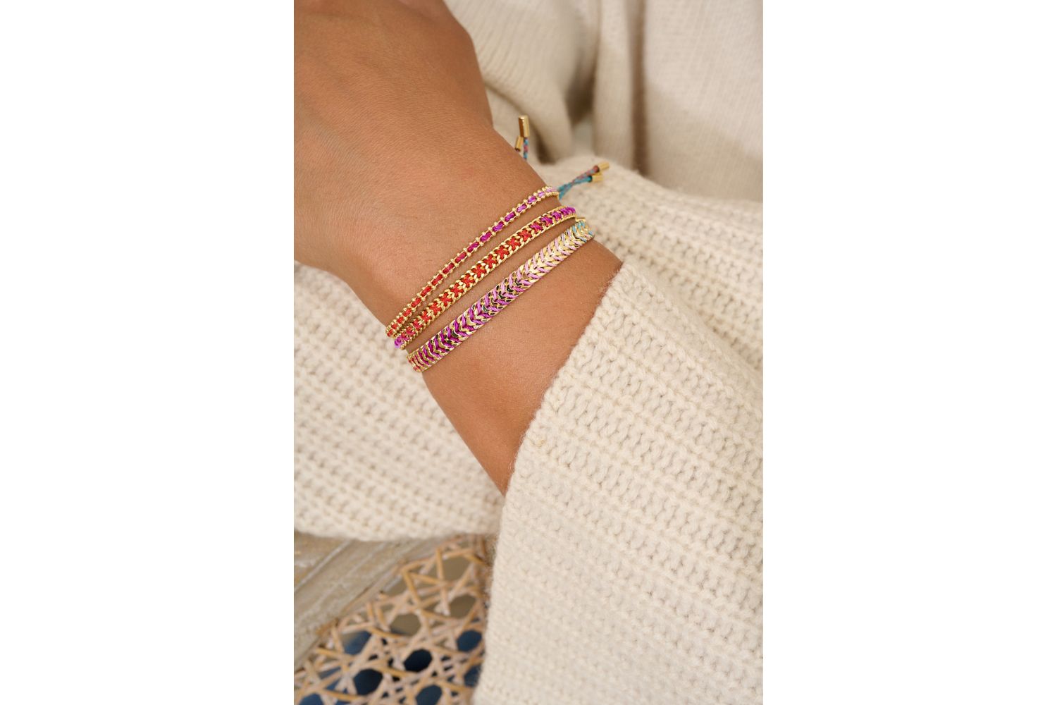 Iztac Gold Moroccan Spice Braided Bracelet styled on a wrist, showcasing bold, earthy colours and golden details, perfect for travel lovers and joyful free spirits.