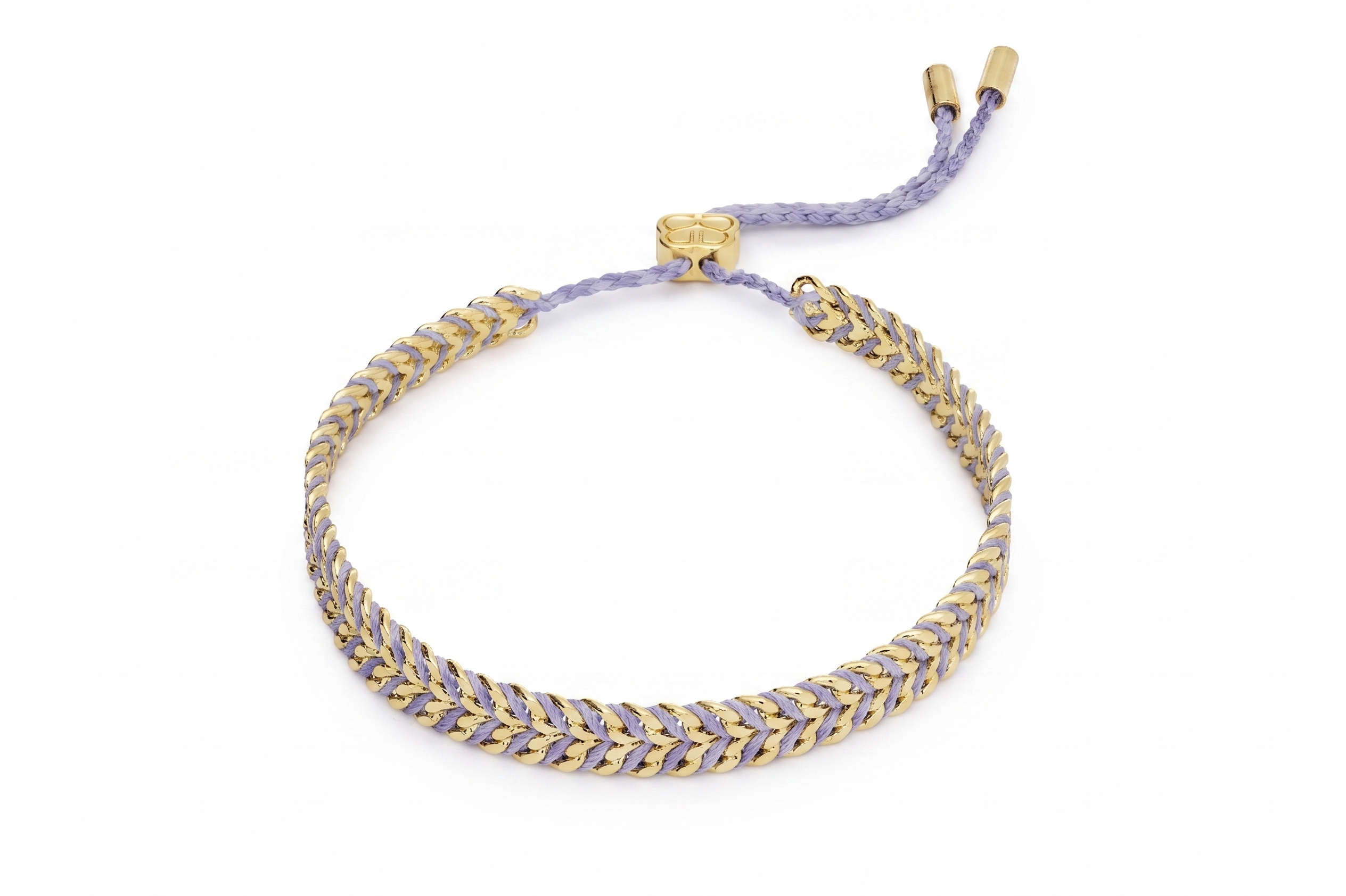 Iztac Lilac and Gold Braided Bracelet featuring soft lilac braided thread woven through a polished gold chain with an adjustable slider fastening.