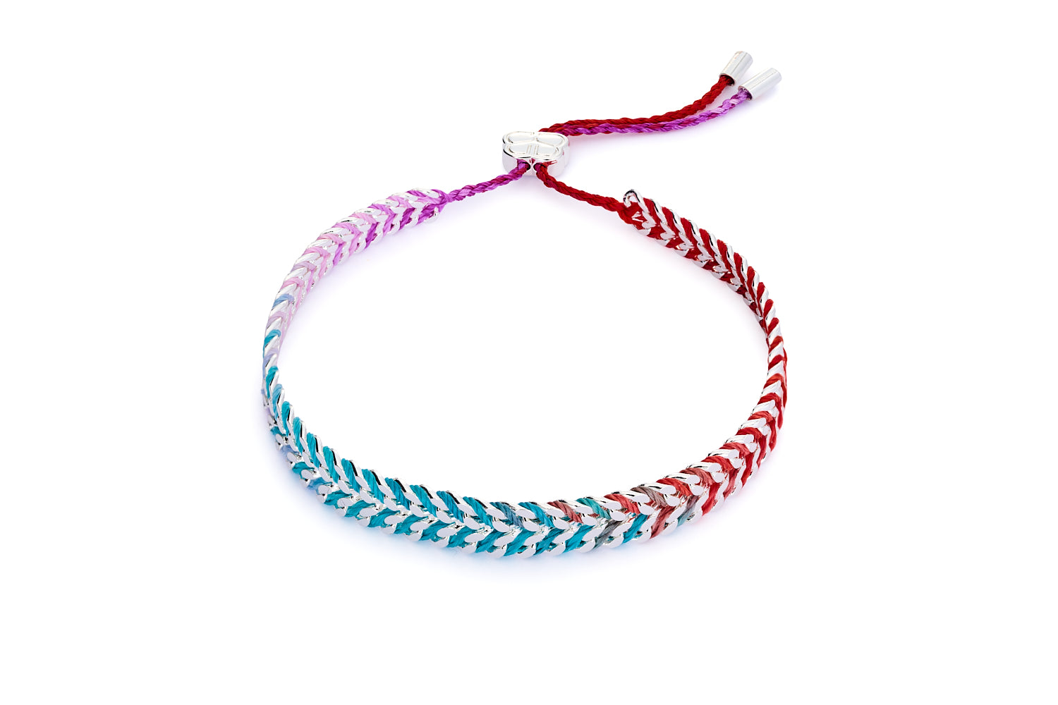 Iztac Moroccan Spice Silver Braided Bracelet featuring woven spice-coloured thread, silver-plated chain, and pull-through slider for adjustable fit.