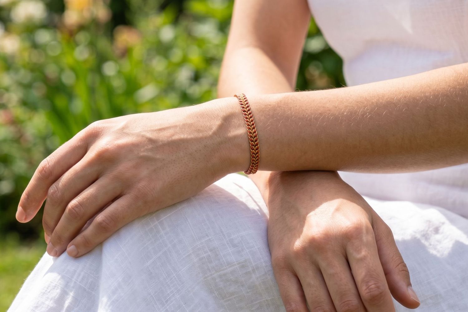 Iztac ruby skies braided bracelet featured on wrist with Boho Betty stacking bracelets