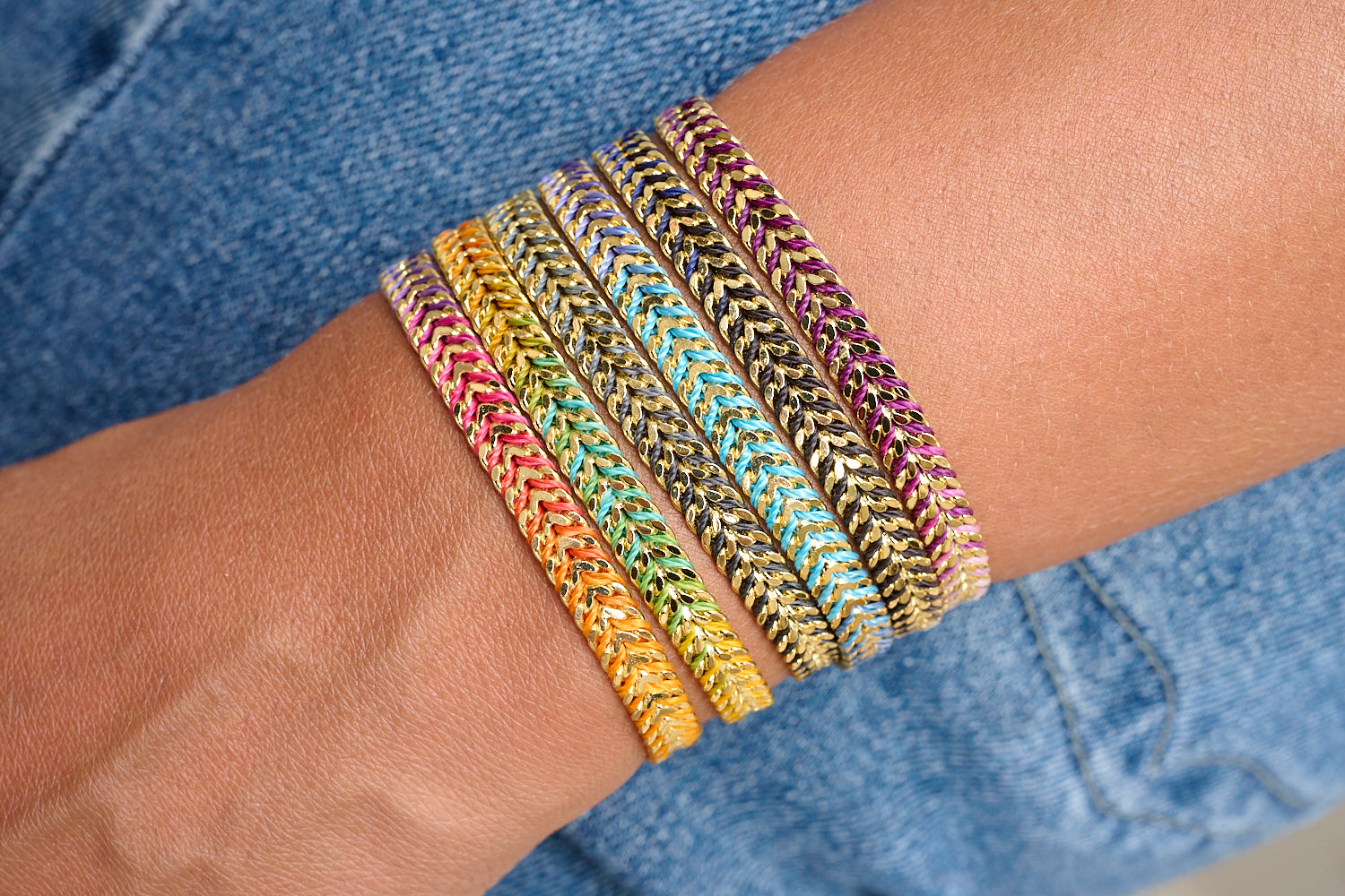 Iztac Midnight Gold braided bracelet featured on wrist with Boho Betty stacking bracelets