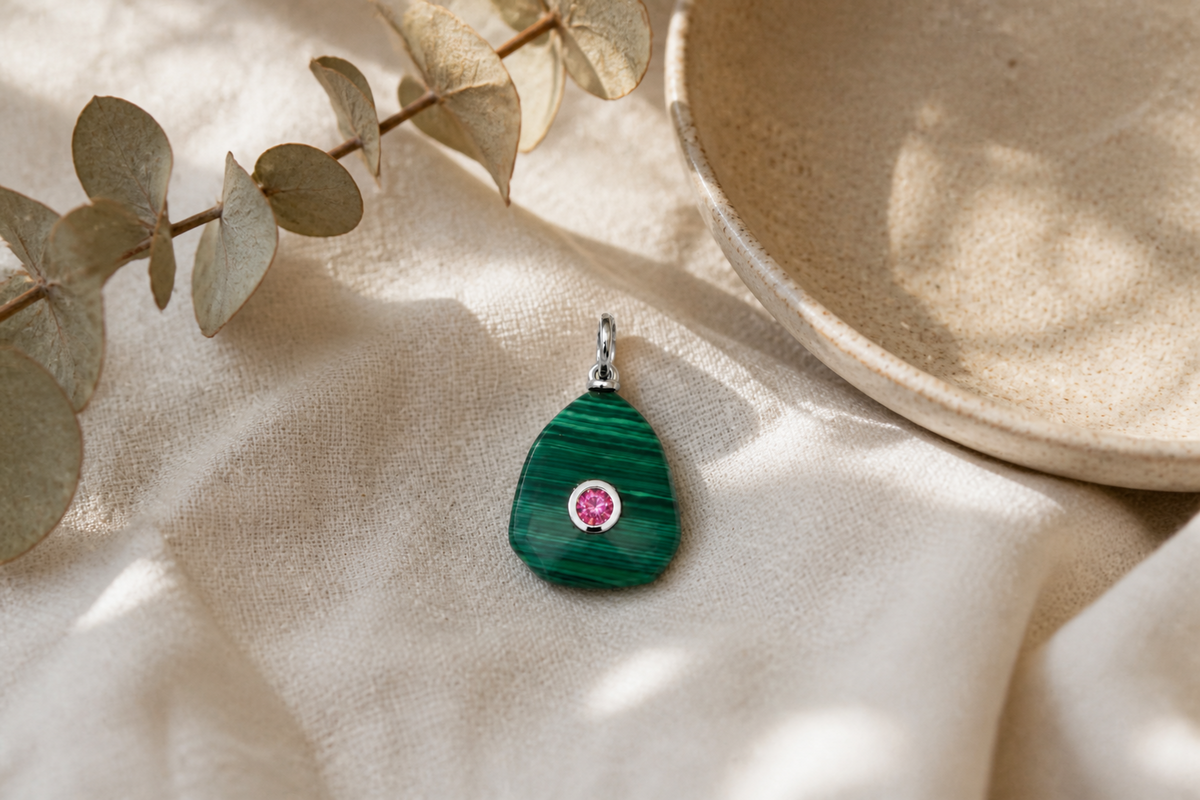 Kalis Malachite Silver Charm by Boho Betty – waterproof green malachite gemstone charm pendant in silver, styled on linen, a collectable charm gift for her