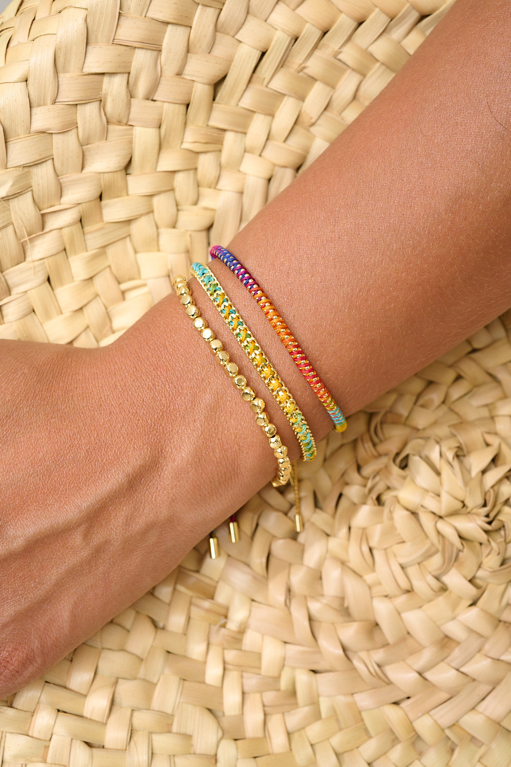 Ko Phi Phi Rainbow Gold Stacking Bracelet styled for summer, with vibrant tones and golden accents, perfect for festivals and feel-good fashion.