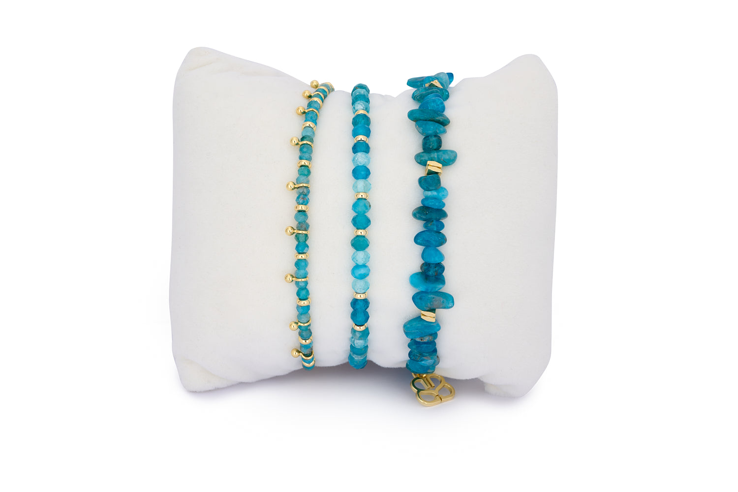 Laguna Apatite & Gold Bracelet Stack featuring three gold-accented blue gemstone bracelets, combining rough-cut and faceted Apatite beads for a radiant boho-luxe look.
