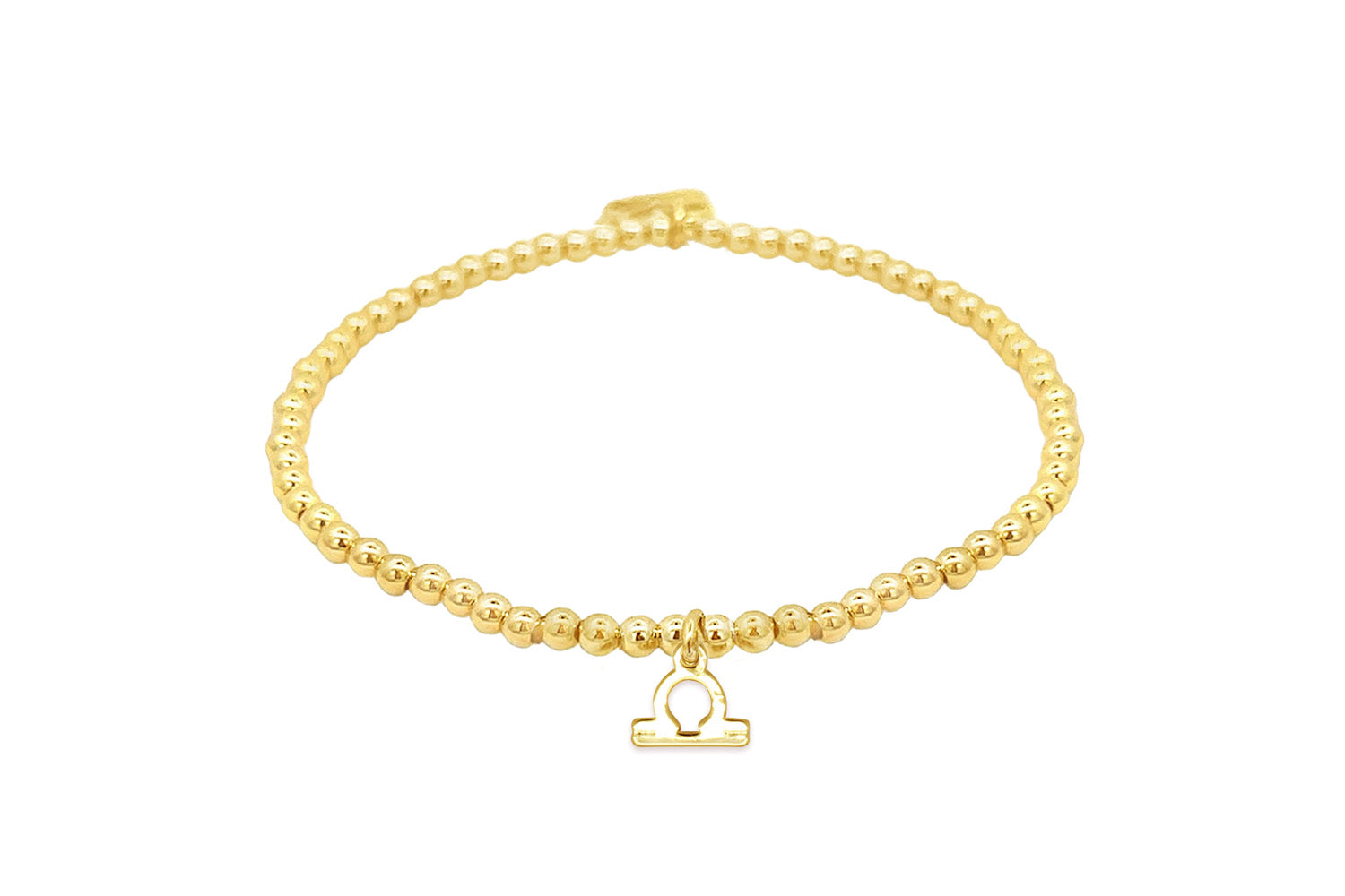 Gold stretch bead bracelet featuring a polished Libra zodiac charm and Boho Betty signature tag, designed for astrology lovers.