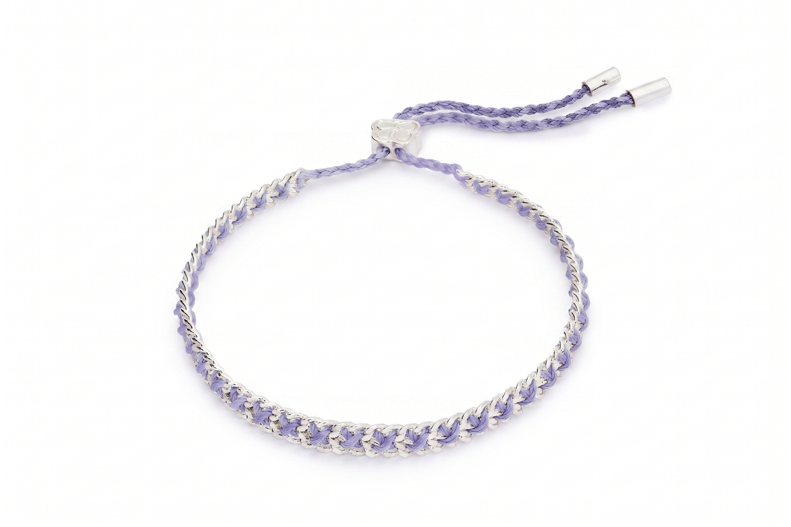Lilia Lilac Silver Woven Bracelet featuring soft lilac braided thread woven through a polished silver chain with an adjustable slider fastening.