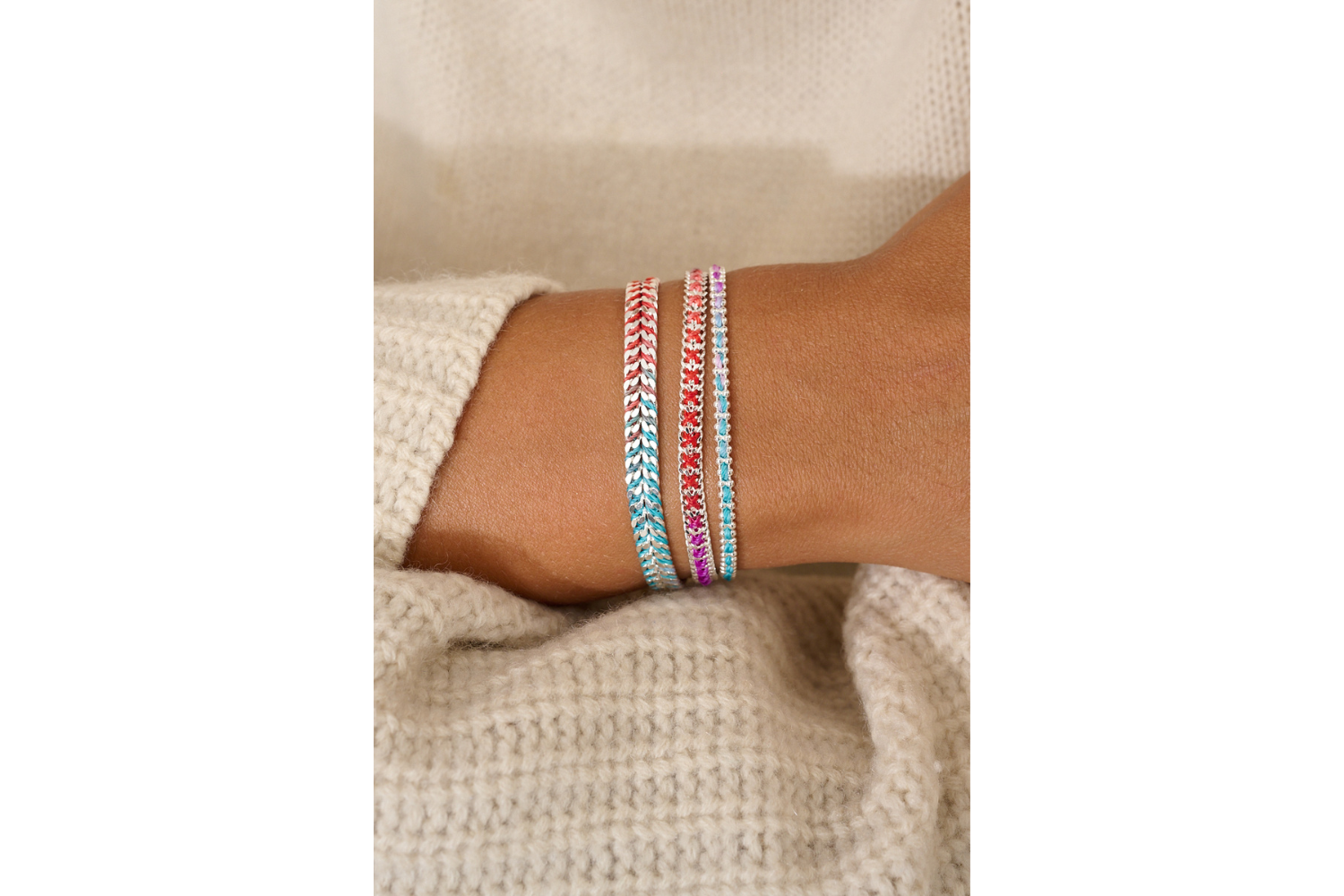 Lilia Moroccan Spice Silver Woven Bracelet featured on stacked wrist with other Boho Betty bracelets