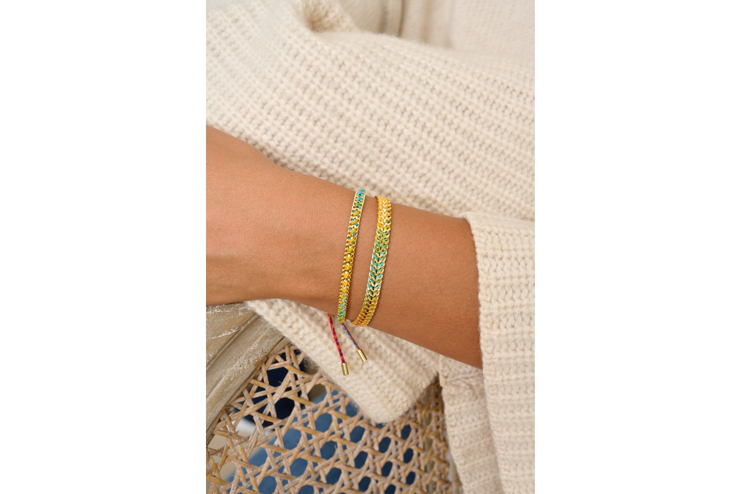 Lilia Rainbow Ombre Gold Bracelet styled on the wrist, showcasing vibrant rainbow colours and shimmering gold chain—perfect for stacking or wearing solo.