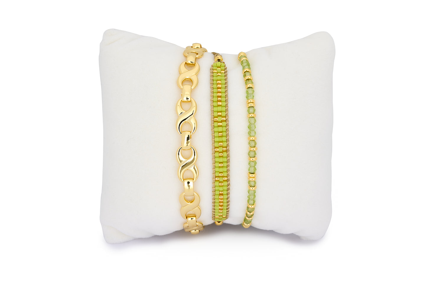 Mana Peridot Gold Bracelet Stack featuring radiant peridot gemstones and gold-plated accents in a vibrant boho-chic design.