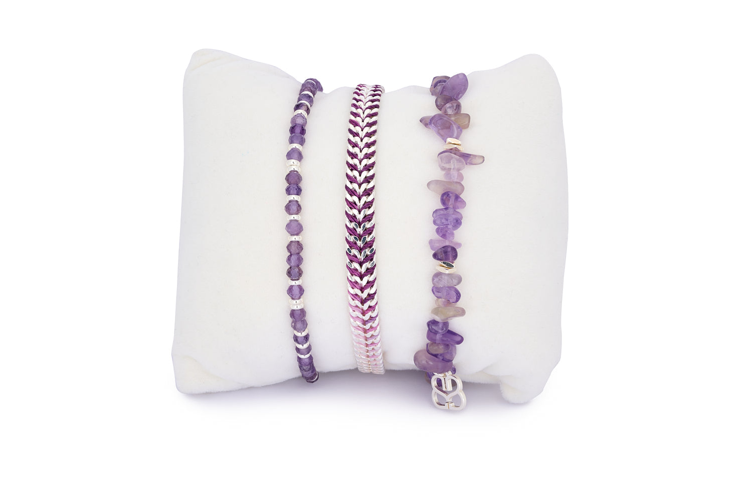Maupiti Silver & Amethyst Gemstone Stacking Bracelet featuring three coordinated purple-toned bracelets—raw crystal, ombré woven, and polished bead styles with silver-plated accents.