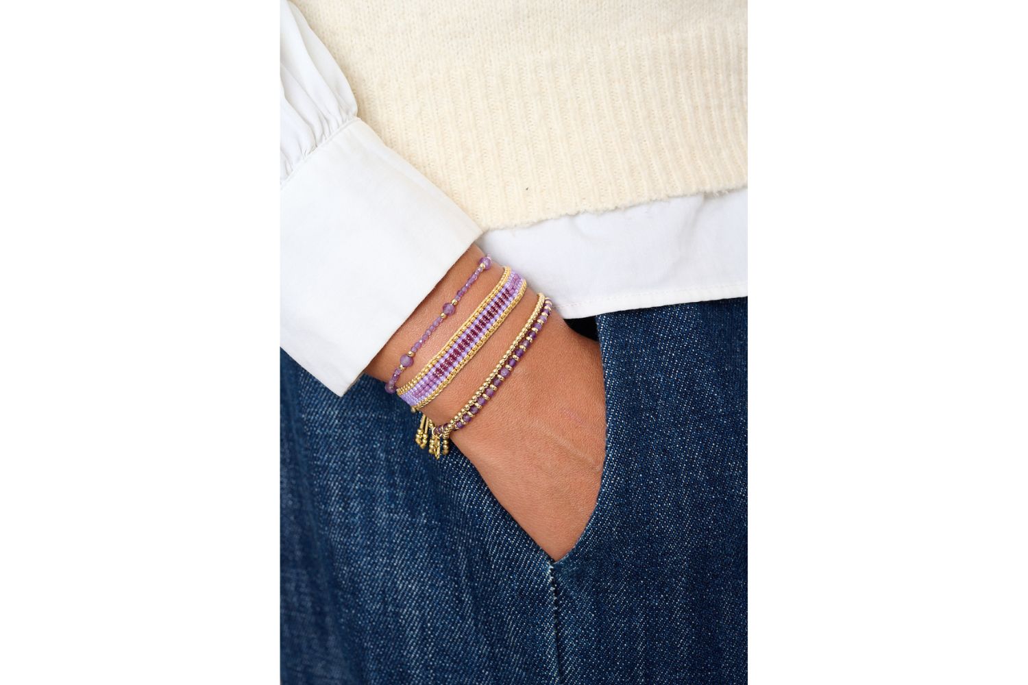 Meadow Gold & Amethyst Gemstone Bracelet styled with Boho Betty stacking bracelets on wrist, capturing an effortlessly boho, soul-led look.