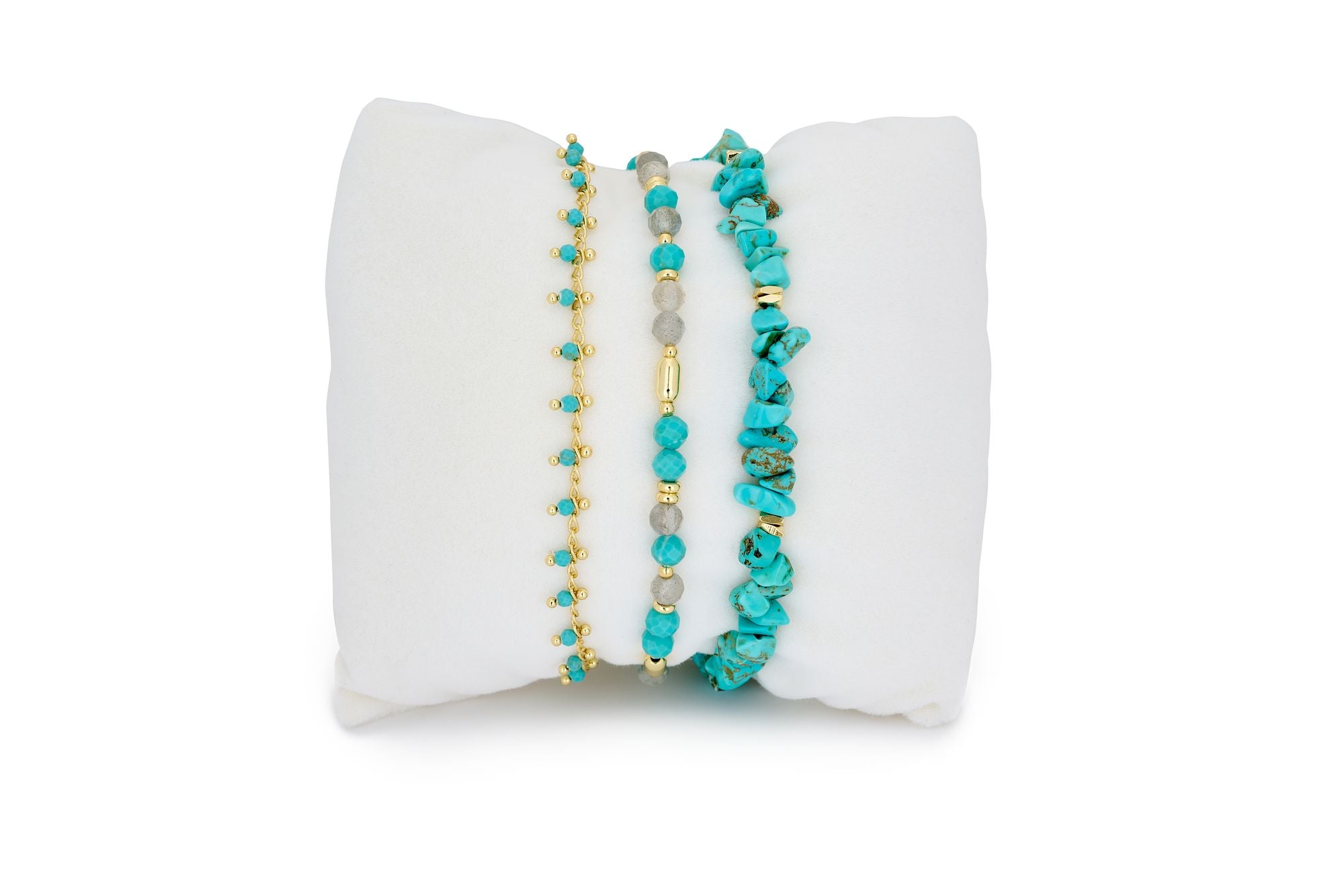 Turquoise bracelet stack featuring raw crystal gemstones, delicate beads, and hidden gold accents for a sun-kissed, boho look