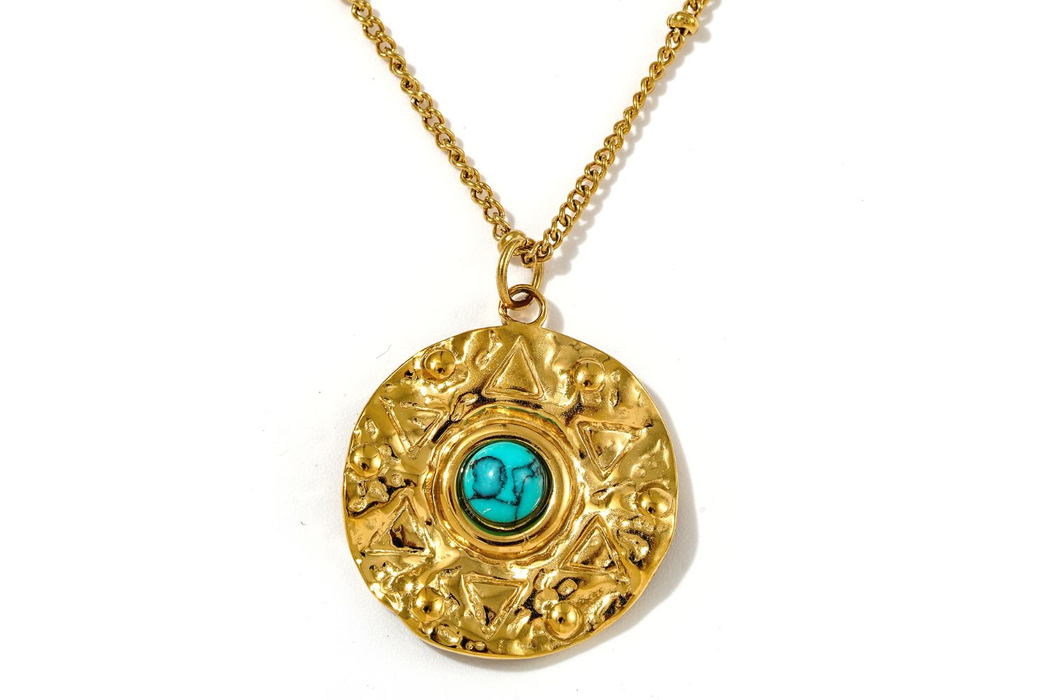 Nerissa Turquoise Howlite Gold Amulet Necklace with textured disc pendant on a beaded gold satellite chain.