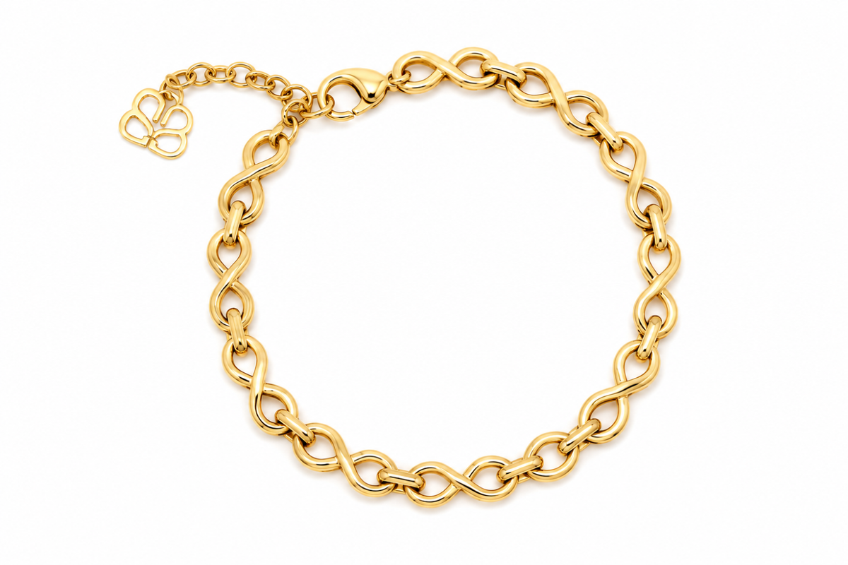 Octave Gold Link Chain Infinity Bracelet featuring oversized infinity links, a waterproof 14k Gold PVD stainless steel finish and an adjustable lobster clasp fastening.