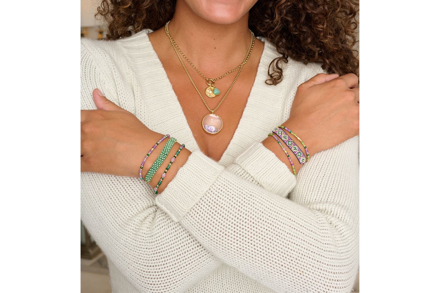 Madeira Purple and Green Gold Bracelet Stack styled with the Eira and Leilani Locket and Samoa Bracelet Stack.