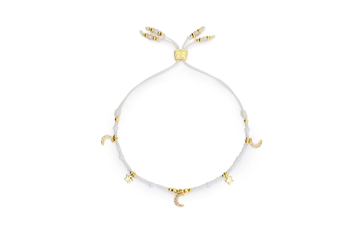 Rania White & Gold Celestial Charm Bracelet with ivory Miyuki beads, golden moon and star charms, and crystal accents on an adjustable slider.