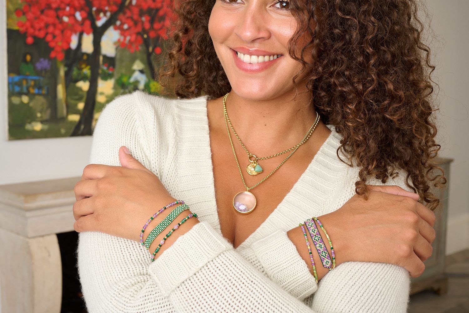 Samoa green and purple gold bracelet stack with amethyst, malachite and Miyuki beads and Madeira Purple and Green Gold Bracelet Stack on the other wrist.