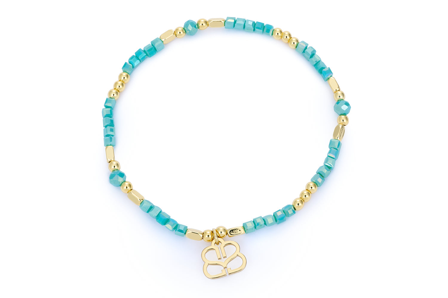 Seraphina Gold & Turquoise Stretch Bead Bracelet featuring a mix of faceted teal and ocean blue beads, accented with 12k gold-plated details and a delicate gold charm in a comfortable stretch fit design.