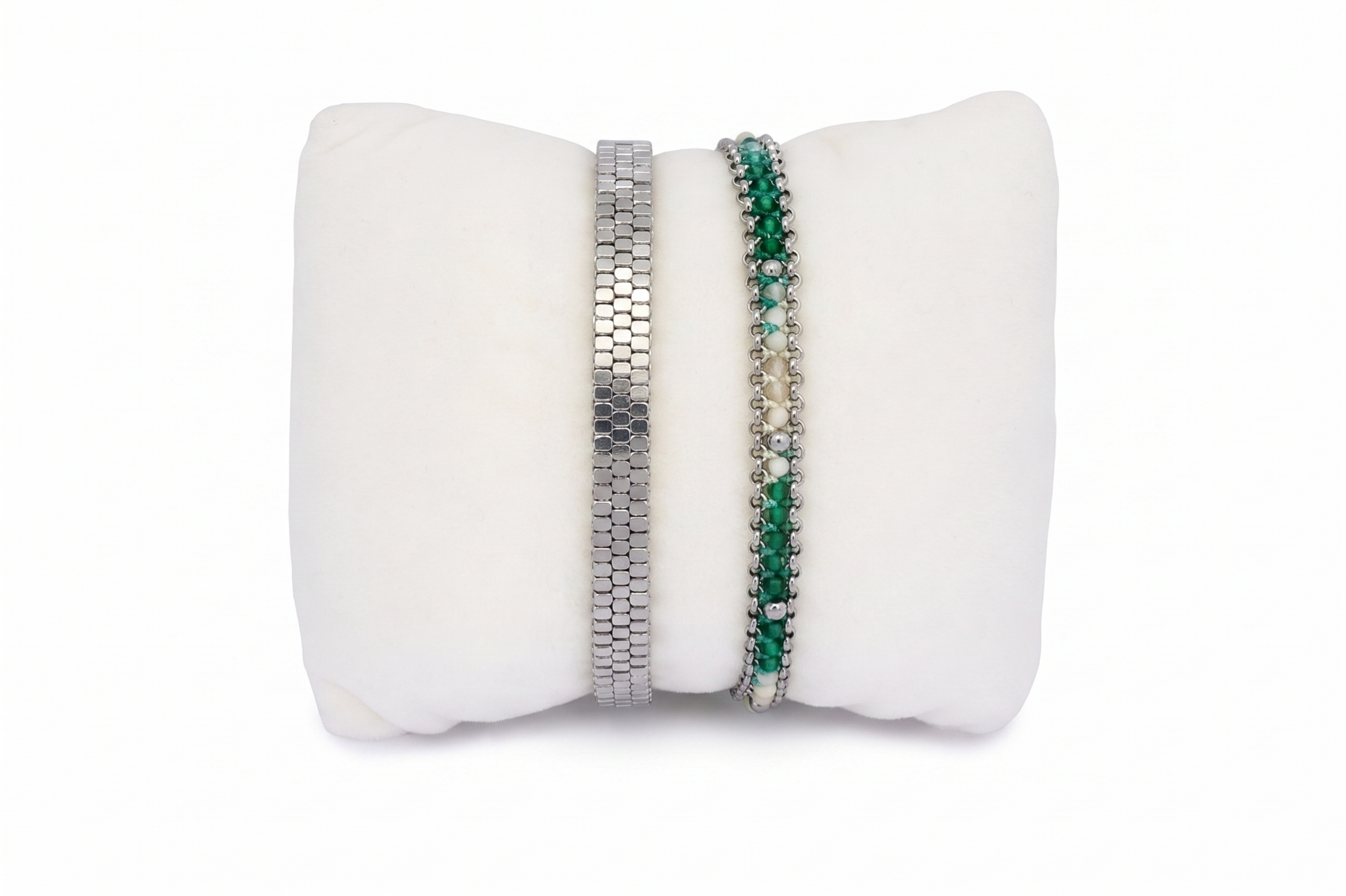 Vaadhoo Turquoise and Silver Bracelet Stack featuring layered silver bracelets with turquoise-toned gemstone details and polished silver bead textures in a coastal-inspired design.