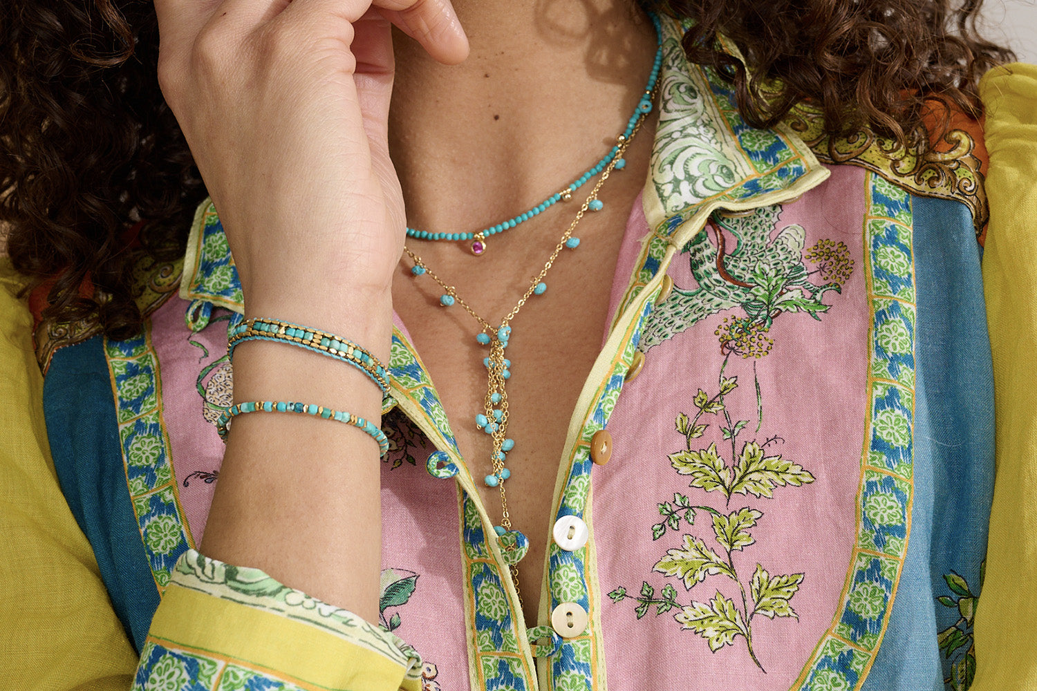 Valentina Turquoise Howlite & Gold Bracelet styled on the wrist, showcasing ocean-inspired blue gemstones, gold accents, and a lightweight boho-chic aesthetic—perfect for layering.