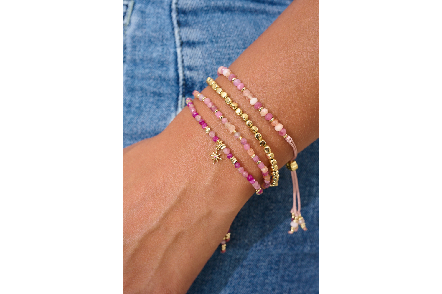 Yarrow Gold Pink Tourmaline Mix Friendship Bracelet styled on the wrist, showing soft pink gemstones and gold accents for a radiant, feminine look.