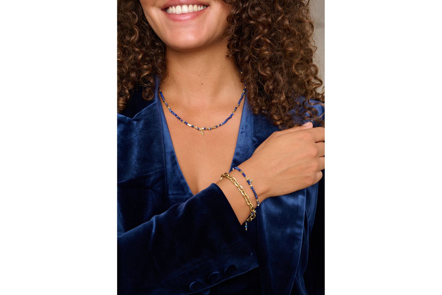 Yolanda & Una Kyanite Gold Jewellery Set styled with navy velvet blazer featuring necklace and bracelet