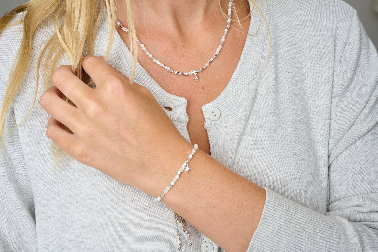 Yolanda & Una Moonstone & Pearl Silver Jewellery Set styled with bracelet and necklace layered in a soft, celestial look.