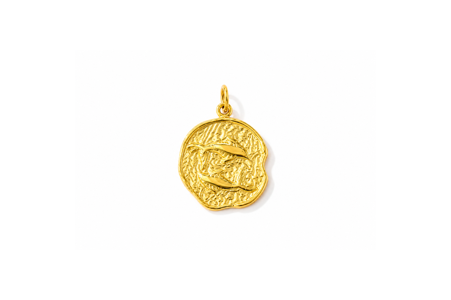 Zaya Pisces Gold Waterproof Zodiac Charm featuring a textured coin-inspired design with a raised Pisces symbol in waterproof 14k Gold PVD-coated stainless steel.