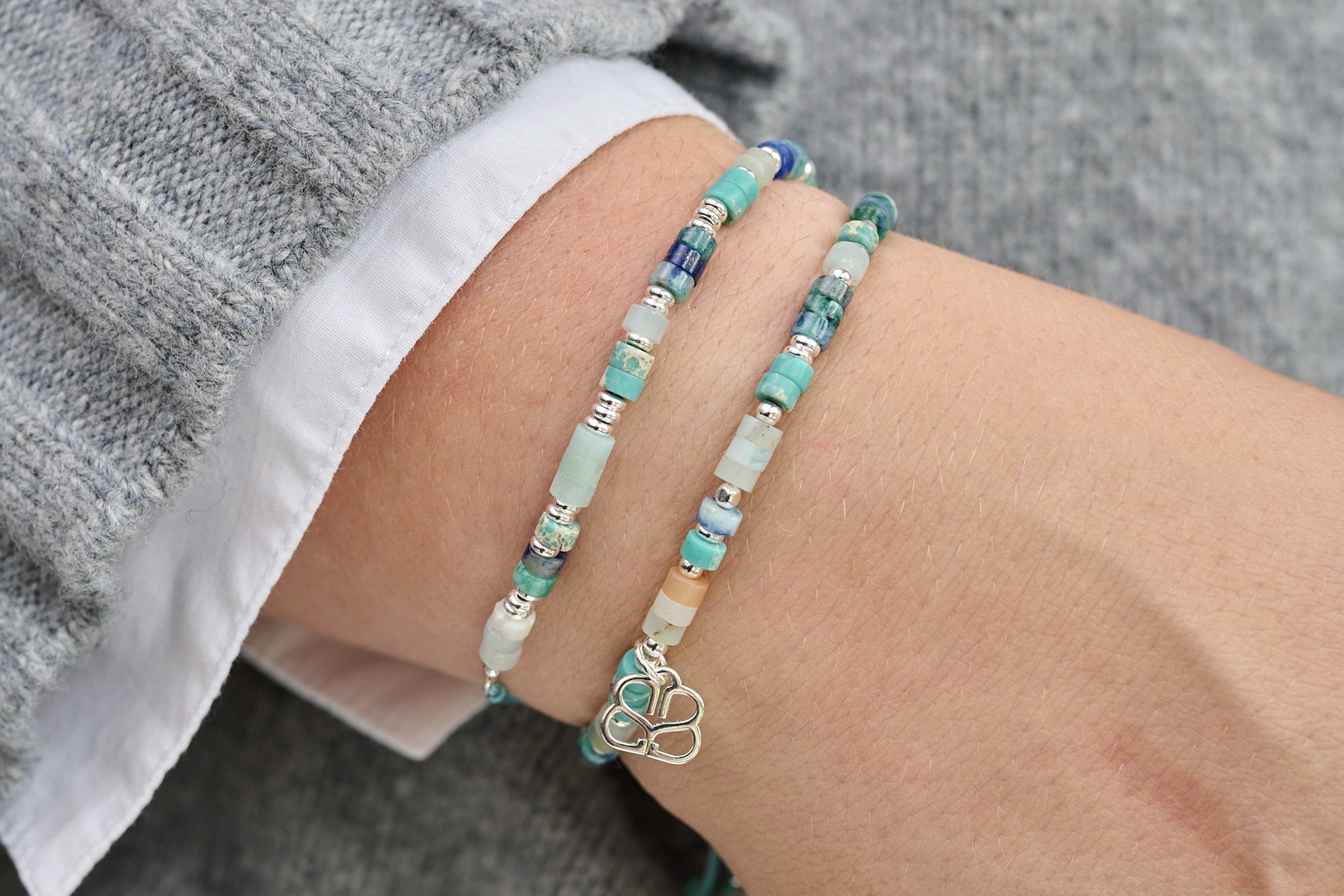 Breeze Blue Gemstone Bracelet styled with silver jewellery for a relaxed, coastal-inspired everyday look.