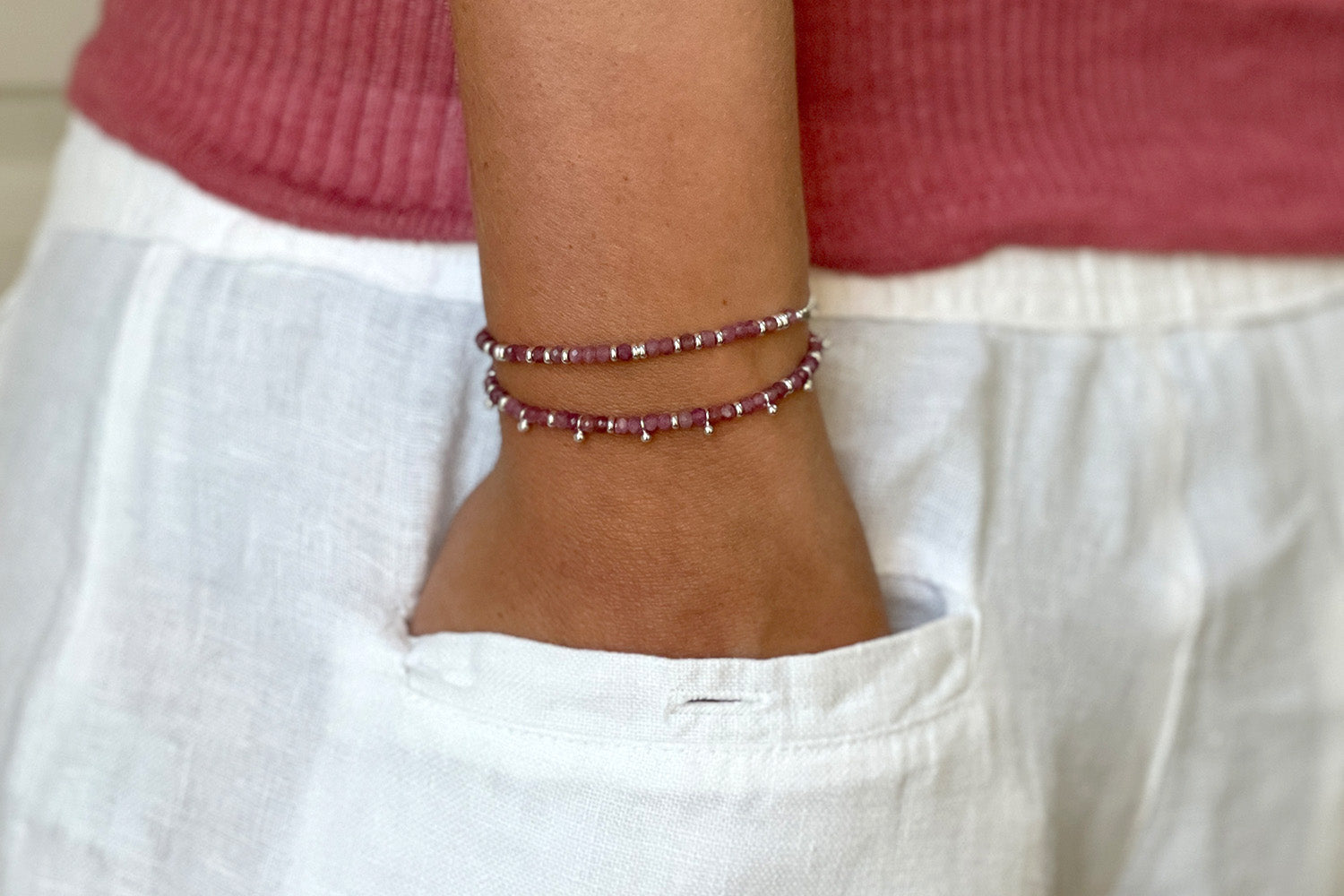 Harmony Pink Tourmaline Bracelet styled with silver jewellery for a soft, romantic, and heart-led everyday look.
